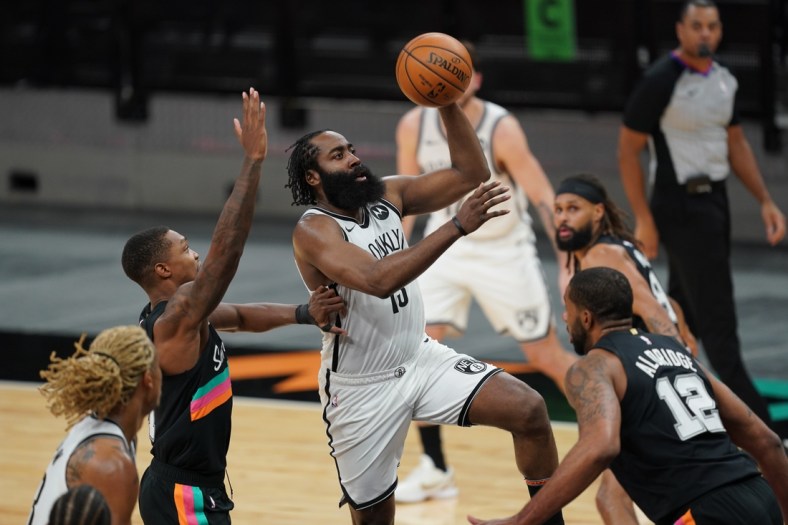 Mar 1, 2021; San Antonio, Texas, USA;  Brooklyn Nets guard James Harden (13) shoots in the second half against the San Antonio Spurs at the AT&T Center. Mandatory Credit: Daniel Dunn-USA TODAY Sports