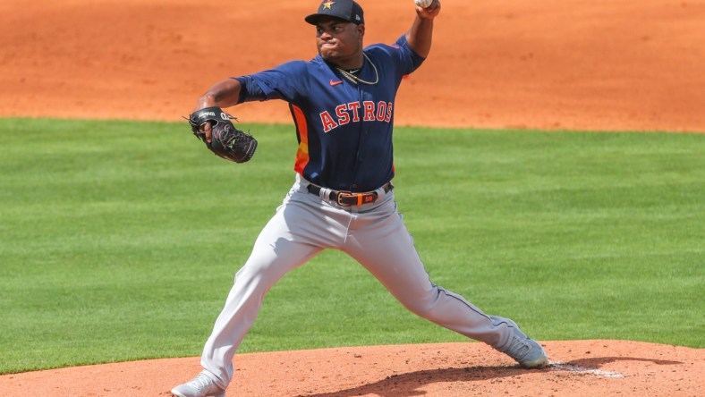 Mar 2, 2021; Port St. Lucie, Florida, USA;  Houston Astros starting pitcher Framber Valdez (59) delivers a pitch against the New York Mets in the first inning at Clover Park. Mandatory Credit: Sam Navarro-USA TODAY Sports