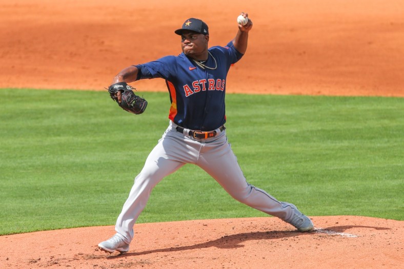 Mar 2, 2021; Port St. Lucie, Florida, USA;  Houston Astros starting pitcher Framber Valdez (59) delivers a pitch against the New York Mets in the first inning at Clover Park. Mandatory Credit: Sam Navarro-USA TODAY Sports