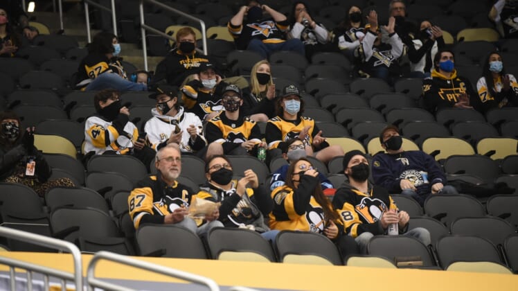 Mar 2, 2021; Pittsburgh, Pennsylvania, USA; Fans look on from the stands during the game between the Pittsburgh Penguins and the Philadelphia Flyers in the first period at PPG Paints Arena. Mandatory Credit: Philip G. Pavely-USA TODAY Sports