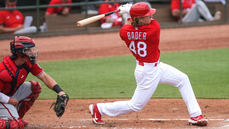 Feb 28, 2021; Jupiter, Florida, USA; St. Louis Cardinals center fielder Harrison Bader (48) swings during his at bat against the Washington Nationals in the  at Roger Dean Chevrolet Stadium. Mandatory Credit: Sam Navarro-USA TODAY Sports