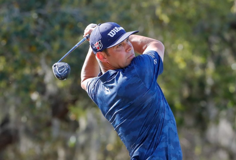 Feb 27, 2021; Bradenton, Florida,  USA; Gary Woodland plays his shot from the 15th tee during the third round of World Golf Championships at The Concession golf tournament at The Concession Golf Club. Mandatory Credit: Mike Watters-USA TODAY Sports