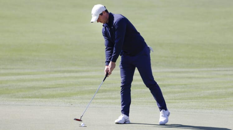 Mar 4, 2021; Orlando, Florida, USA; Rory McIlroy taps in his putt on the 18th green during the first round of the Arnold Palmer Invitational golf tournament at Bay Hill Club & Lodge. Mandatory Credit: Reinhold Matay-USA TODAY Sports