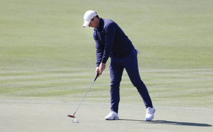 Mar 4, 2021; Orlando, Florida, USA; Rory McIlroy taps in his putt on the 18th green during the first round of the Arnold Palmer Invitational golf tournament at Bay Hill Club & Lodge. Mandatory Credit: Reinhold Matay-USA TODAY Sports