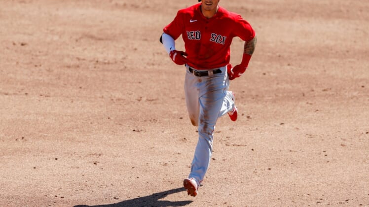 Mar 4, 2021; Sarasota, Florida, USA;  Boston Red Sox center fielder Jarren Duran (93) rounds the bases after hitting a home run in the top of the second inning during spring training at Ed Smith Stadium. Mandatory Credit: Nathan Ray Seebeck-USA TODAY Sports