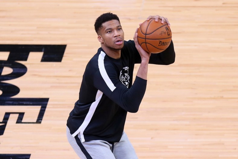 Mar 4, 2021; Memphis, Tennessee, USA; Milwaukee Bucks forward Giannis Antetokounmpo warms up prior to the game against the Memphis Grizzlies at FedExForum. Mandatory Credit: Nelson Chenault-USA TODAY Sports