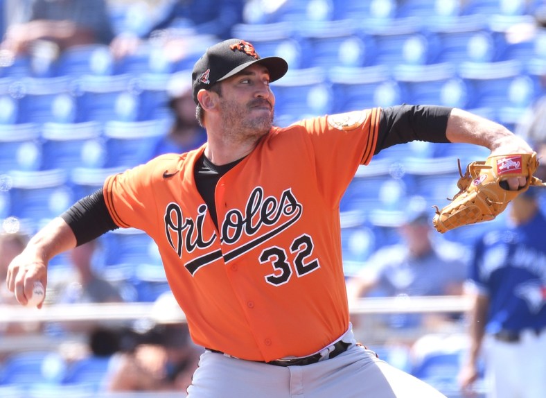 Mar 5, 2021; Dunedin, Florida, USA; Baltimore Orioles pitcher Matt Harvey (32) throws a pitch in the first inning against the Toronto Blue Jays during spring training at TD Ballpark. Mandatory Credit: Jonathan Dyer-USA TODAY Sports