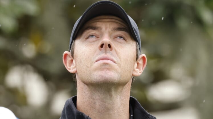 Mar 6, 2021; Orlando, Florida, USA; A light rain falls as Rory McIlroy prepares to hit his drive on the first hole during the third round of the Arnold Palmer Invitational golf tournament at Bay Hill Club & Lodge. Mandatory Credit: Reinhold Matay-USA TODAY Sports