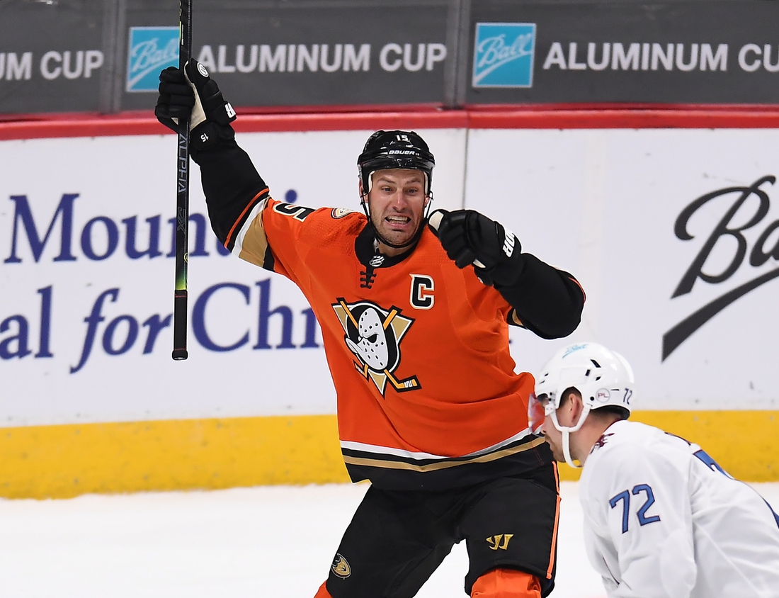 Mar 6, 2021; Denver, Colorado, USA; Anaheim Ducks center Ryan Getzlaf (15) celebrates after scoring the overtime winning goal against the Colorado Avalanche at Ball Arena. Mandatory Credit: Ron Chenoy-USA TODAY Sports