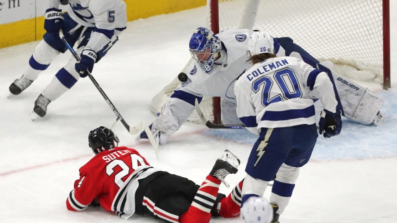 Mar 7, 2021; Chicago, Illinois, USA; Tampa Bay Lightning goaltender Andrei Vasilevskiy (88) makes a save on a shot from Chicago Blackhawks center Pius Suter (24) during the first period at the United Center. Mandatory Credit: Dennis Wierzbicki-USA TODAY Sports