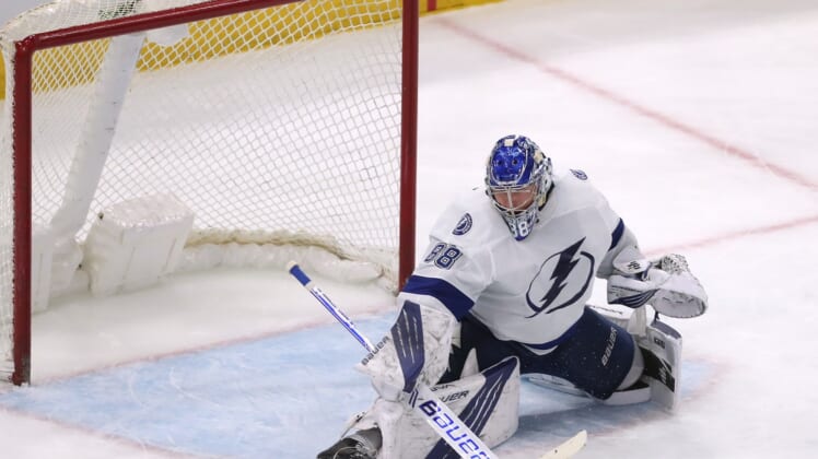 Mar 7, 2021; Chicago, Illinois, USA; Tampa Bay Lightning goaltender Andrei Vasilevskiy (88) makes a save during the third period against the Chicago Blackhawks at the United Center. Mandatory Credit: Dennis Wierzbicki-USA TODAY Sports