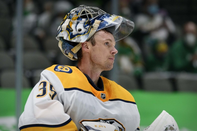 Mar 7, 2021; Dallas, Texas, USA; Nashville Predators goaltender Pekka Rinne (35) reacts to giving up three goals during the third period against the Dallas Stars at the American Airlines Center. Mandatory Credit: Jerome Miron-USA TODAY Sports