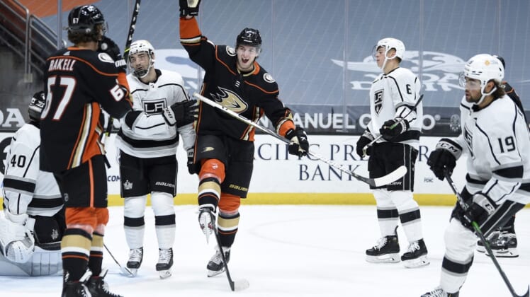 Mar 8, 2021; Anaheim, California, USA; Anaheim Ducks defenseman Ben Hutton (7) reacts after scoring a goal during the second period against the Los Angeles Kings at Honda Center. Mandatory Credit: Kelvin Kuo-USA TODAY Sports