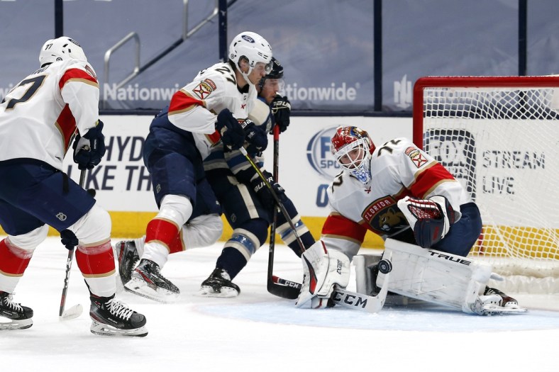 Mar 9, 2021; Columbus, Ohio, USA; Florida Panthers goalie Sergei Bobrovsky (72) stops the shot of Columbus Blue Jackets right wing Cam Atkinson (13) during the first period at Nationwide Arena. Mandatory Credit: Russell LaBounty-USA TODAY Sports