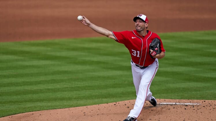 Mar 10, 2021; West Palm Beach, Florida, USA; Washington Nationals starting pitcher Max Scherzer (31) delivers a pitch in the 2nd inning of the spring training game against the St. Louis Cardinals at The Ballpark of the Palm Beaches. Mandatory Credit: Jasen Vinlove-USA TODAY Sports
