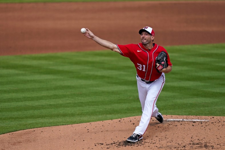 Mar 10, 2021; West Palm Beach, Florida, USA; Washington Nationals starting pitcher Max Scherzer (31) delivers a pitch in the 2nd inning of the spring training game against the St. Louis Cardinals at The Ballpark of the Palm Beaches. Mandatory Credit: Jasen Vinlove-USA TODAY Sports