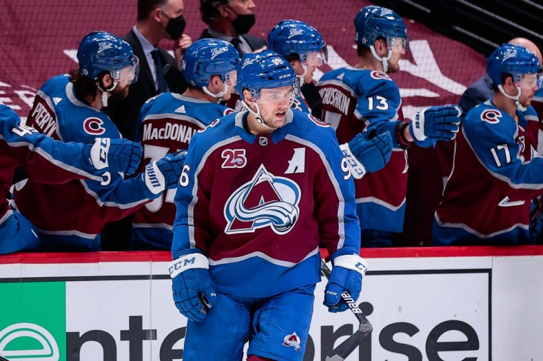 Mar 12, 2021; Denver, Colorado, USA; Colorado Avalanche right wing Mikko Rantanen (96) skates by the bench after scoring a goal against the Los Angeles Kings in the second period at Ball Arena. Mandatory Credit: Isaiah J. Downing-USA TODAY Sports