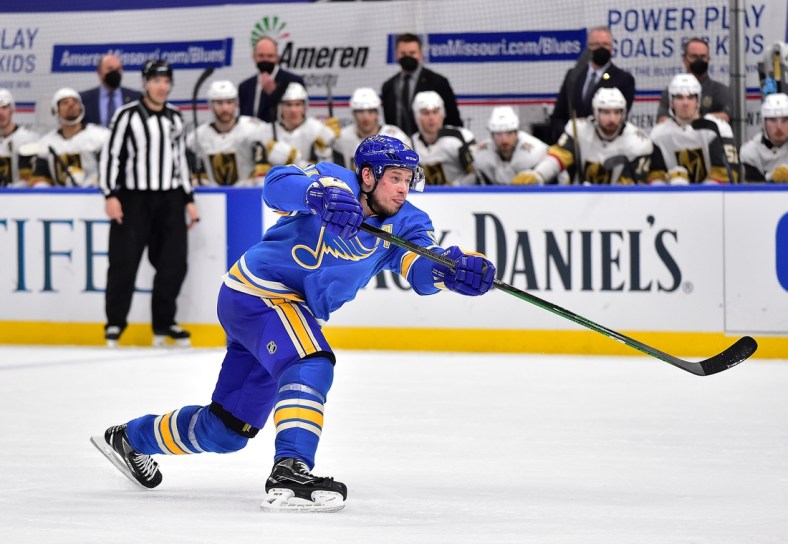 Mar 13, 2021; St. Louis, Missouri, USA;  St. Louis Blues right wing Vladimir Tarasenko (91) shoots during the third period against the Vegas Golden Knights at Enterprise Center. Mandatory Credit: Jeff Curry-USA TODAY Sports