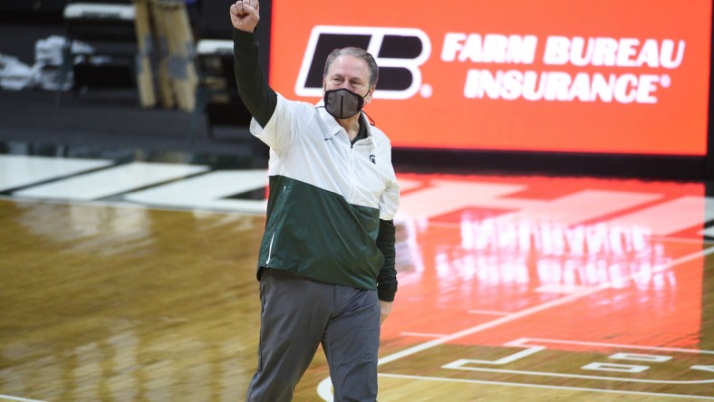 Mar 7, 2021; East Lansing, Michigan, USA; Michigan State Spartans head coach Tom Izzo celebrates after the game against the Michigan Wolverines at Jack Breslin Student Events Center. Mandatory Credit: Tim Fuller-USA TODAY Sports