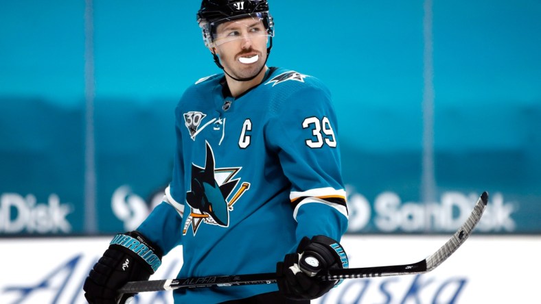 Mar 8, 2021; San Jose, California, USA; San Jose Sharks center Logan Couture (39) stands on the ice during the third period against the St. Louis Blues at SAP Center at San Jose. Mandatory Credit: Darren Yamashita-USA TODAY Sports