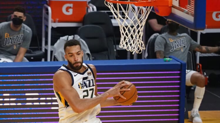 Mar 14, 2021; San Francisco, California, USA; Utah Jazz center Rudy Gobert (27) controls a rebound against the Golden State Warriors during the first quarter at Chase Center. Mandatory Credit: Kelley L Cox-USA TODAY Sports