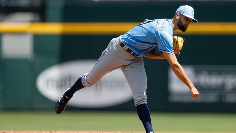 Mar 14, 2021; North Port, Florida, USA; Tampa Bay Rays relief pitcher Nick Anderson (70) pitches against the Atlanta Braves in the third inning during spring training at CoolToday Park. Mandatory Credit: Nathan Ray Seebeck-USA TODAY Sports