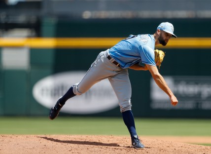 Mar 14, 2021; North Port, Florida, USA; Tampa Bay Rays relief pitcher Nick Anderson (70) pitches against the Atlanta Braves in the third inning during spring training at CoolToday Park. Mandatory Credit: Nathan Ray Seebeck-USA TODAY Sports