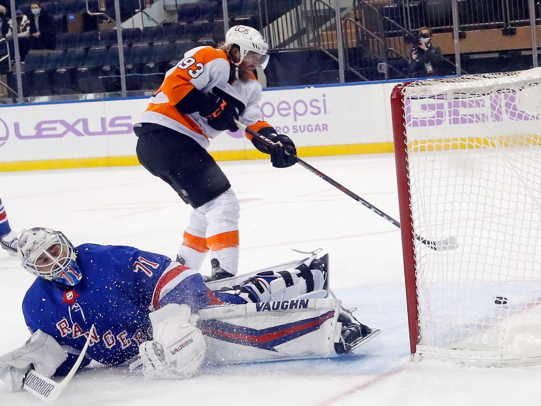 Mar 15, 2021; New York, New York, USA;  Jakub Voracek #93 of the Philadelphia Flyers scores at 3:47 of overtime against Keith Kinkaid #71 of the New York Rangers at Madison Square Garden on March 15, 2021 in New York City. The Flyers defeated the Rangers 5-4 in overtime.  Mandatory Credit:  Bruce Bennett/POOL PHOTOS-USA TODAY Sports