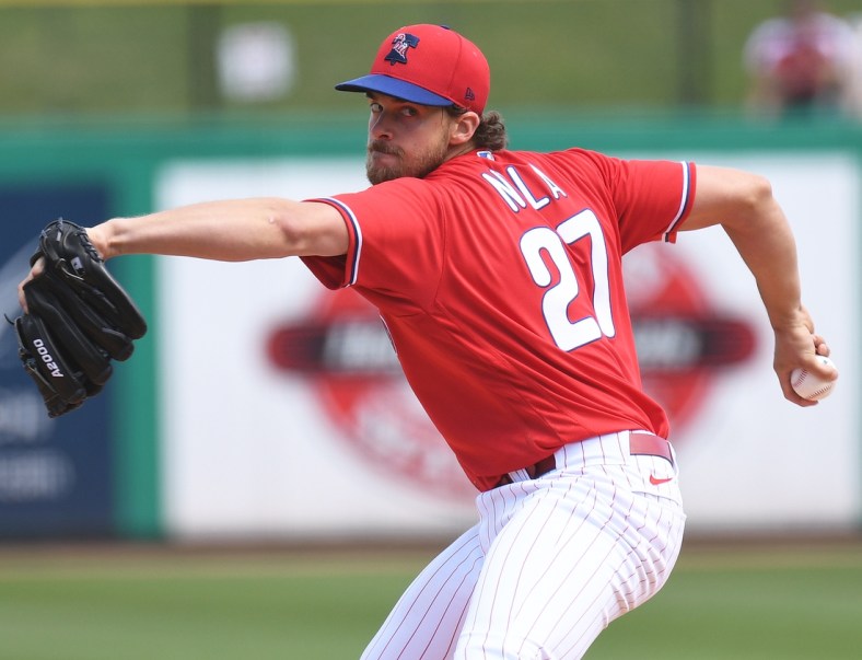 Mar 16, 2021; Clearwater, Florida, USA; Philadelphia Phillies pitcher Aaron Nola (27) throws a pitch in the first inning against the Toronto Blue Jays during spring training at BayCare Ballpark. Mandatory Credit: Jonathan Dyer-USA TODAY Sports