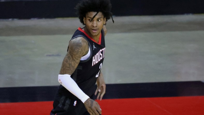 Mar 17, 2021; Houston, Texas, USA; Houston Rockets guard Kevin Porter Jr. (3) looks on during the third quarter against the Golden State Warriors at Toyota Center. Mandatory Credit: Carmen Mandato/POOL PHOTOS-USA TODAY Sports