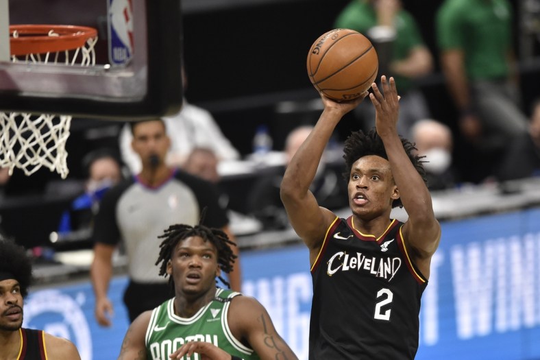 Mar 17, 2021; Cleveland, Ohio, USA; Cleveland Cavaliers guard Collin Sexton (2) shoots in the fourth quarter against the Boston Celtics at Rocket Mortgage FieldHouse. Mandatory Credit: David Richard-USA TODAY Sports