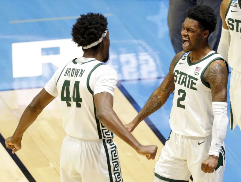 Michigan State Spartans forward Gabe Brown (44) and Michigan State Spartans guard Rocket Watts (2) react after a play during the First Four of the 2021 NCAA Tournament on Thursday, March 18, 2021, at Mackey Arena in West Lafayette, Ind. Mandatory Credit: Robert Scheer/IndyStar via USA TODAY Sports