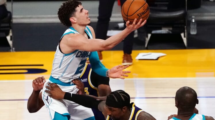 Mar 18, 2021; Los Angeles, California, USA; Charlotte Hornets guard LaMelo Ball (2) moves to the basket against the Los Angeles Lakers during the first half at Staples Center. Mandatory Credit: Gary A. Vasquez-USA TODAY Sports