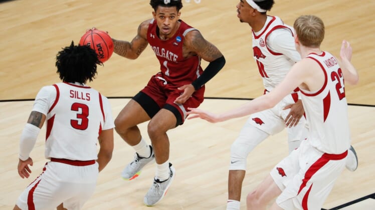Colgate Raiders guard Jordan Burns (1) attempts to maneuver around Arkansas Razorbacks defense during the first round of the 2021 NCAA Tournament on Friday, March 19, 2021, at Bankers Life Fieldhouse in Indianapolis, Ind. Mandatory Credit: Adam Cairns/IndyStar via USA TODAY Sports