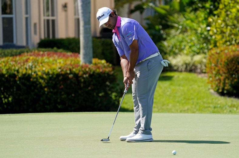 Mar 19, 2021; Palm Beach Gardens, Florida, USA; Rafael Campos putts on the 17th green during the second round of The Honda Classic golf tournament at PGA National (Champion). Mandatory Credit: Jasen Vinlove-USA TODAY Sports
