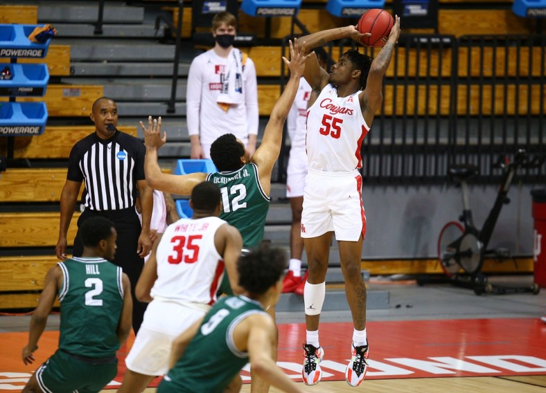Mar 19, 2021; Bloomington, Indiana, USA; Houston Cougars forward Brison Gresham (55) shoots against the Cleveland State Vikings during the second half in the first round of the 2021 NCAA Tournament at Simon Skjodt Assembly Hall. Mandatory Credit: Robert Goddin-USA TODAY Sports