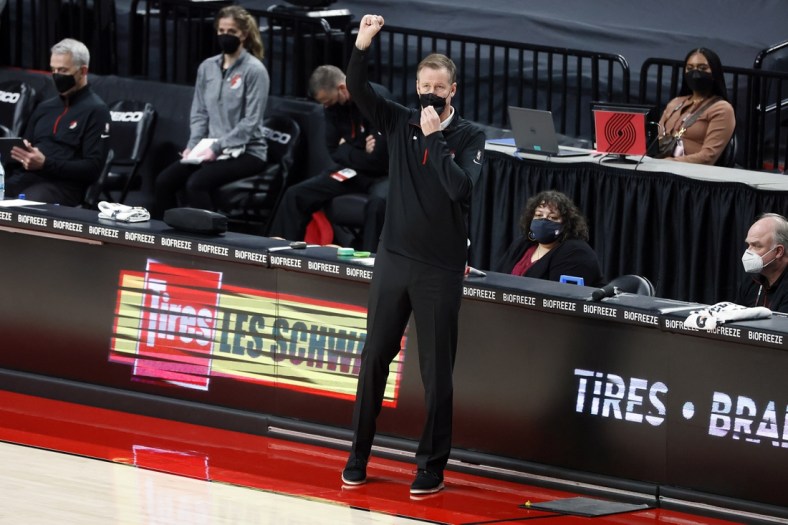 Mar 19, 2021; Portland, Oregon, USA; Portland Trail Blazers head coach Terry Stotts gestures from the sideline during the first half against the Dallas Mavericks at Moda Center. Mandatory Credit: Soobum Im-USA TODAY Sports