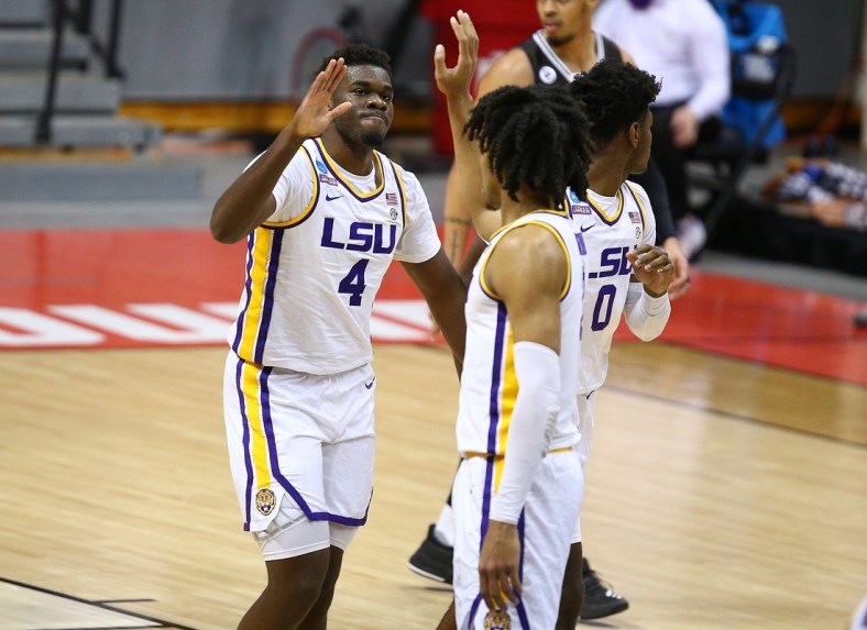 Mar 20, 2021; Bloomington, Indiana, USA; Louisiana State Tigers forward Darius Days (4) celebrates with forward Trendon Watford (2) and forward Mwani Wilkinson (0) against the St. Bonaventure Bonnies during the second half in the first round of the 2021 NCAA Tournament at Simon Skjodt Assembly Hall. Mandatory Credit: Jordan Prather-USA TODAY Sports