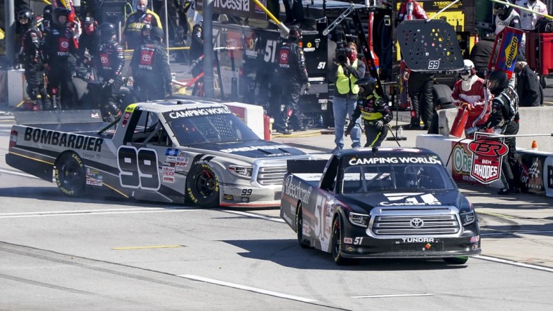 Mar 20, 2021; Hampton, GA, USA; NASCAR Gander RV and Outdoors Truck Series driver Kyle Busch (51) leaves the pit at Atlanta Motor Speedway. Mandatory Credit: Marvin Gentry-USA TODAY Sports