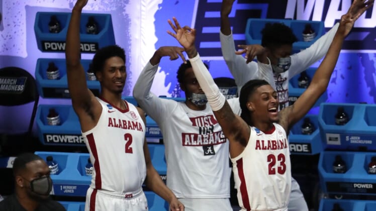 Alabama Crimson Tide guard John Petty Jr. (23) and Alabama Crimson Tide forward Jordan Bruner (2) celebrate a three-pointer during the first round of the 2021 NCAA Tournament on Saturday, March 20, 2021, at Hinkle Fieldhouse in Indianapolis, Ind. Mandatory Credit: Jenna Watson/IndyStar via USA TODAY Sports