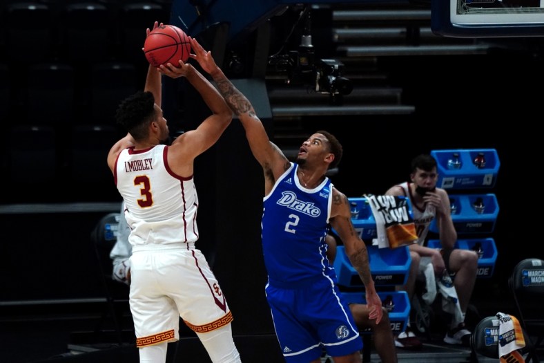 Mar 20, 2021; Indianapolis, Indiana, USA; Southern California Trojans forward Isaiah Mobley (3) shoots the ball while defended by Drake Bulldogs forward Tremell Murphy (2) during the second half in the first round of the 2021 NCAA Tournament at Bankers Life Fieldhouse. Mandatory Credit: Kirby Lee-USA TODAY Sports