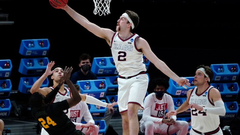 Mar 20, 2021; Indianapolis, Indiana, USA; Gonzaga Bulldogs forward Drew Timme (2) blocks a shot by Norfolk State Spartans guard Jalen Hawkins (24) during the first half in the first round of the 2021 NCAA Tournament at Bankers Life Fieldhouse. Mandatory Credit: Kirby Lee-USA TODAY Sports