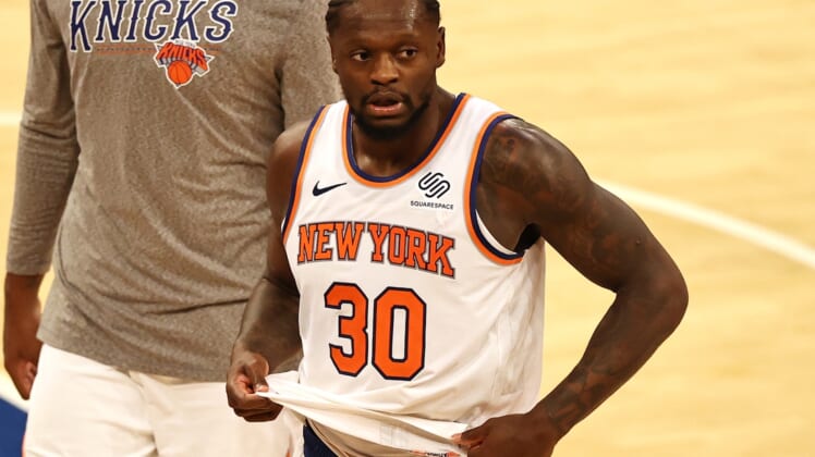 Mar 21, 2021; New York, New York, USA;    Julius Randle #30 of the New York Knicks walks off the court after the loss to the Philadelphia 76ers at Madison Square Garden on March 21, 2021 in New York City.The Philadelphia 76ers defeated the New York Knicks 101-100 in overtime. Mandatory Credit: Elsa/Pool Photo-USA TODAY Sports