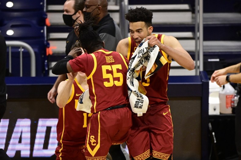 Mar 22, 2021; Indianapolis, Indiana, USA; Southern California Trojans forward Isaiah Mobley (3) celebrates with guard Amar Ross (55) during the second half in the second round of the 2021 NCAA Tournament against the Kansas Jayhawks at Hinkle Fieldhouse. Mandatory Credit: Marc Lebryk-USA TODAY Sports