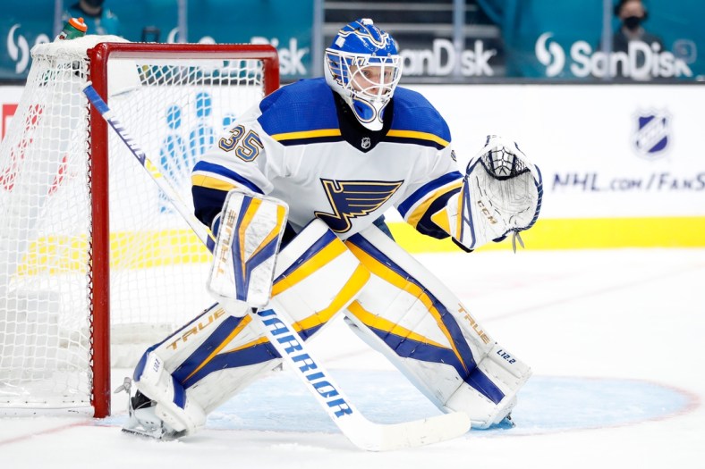 Mar 20, 2021; San Jose, California, USA; St. Louis Blues goaltender Ville Husso (35) stands in the net during the second period against the San Jose Sharks at SAP Center at San Jose. Mandatory Credit: Darren Yamashita-USA TODAY Sports