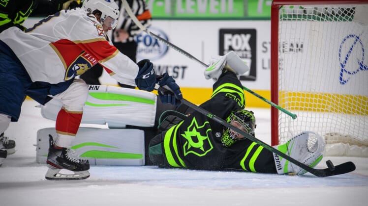 Mar 27, 2021; Dallas, Texas, USA; Dallas Stars goaltender Anton Khudobin (35) allows a second goal to Florida Panthers center Carter Verhaeghe (23) during the first period at the American Airlines Center. Mandatory Credit: Jerome Miron-USA TODAY Sports