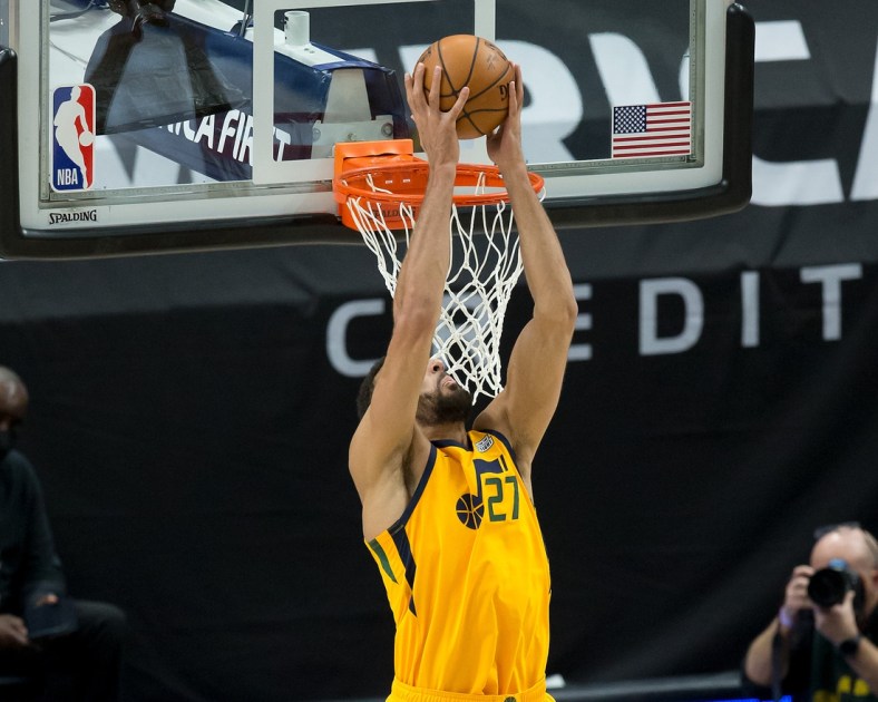 Mar 27, 2021; Salt Lake City, Utah, USA; Utah Jazz center Rudy Gobert (27) goes up for a pass at the basket during the first half against the Memphis Grizzlies at Vivint Smart Home Arena. Mandatory Credit: Russell Isabella-USA TODAY Sports
