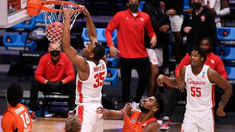 Mar 27, 2021; Indianapolis, Indiana, USA; Houston Cougars forward Fabian White Jr. (35) dunks during the second half against the Syracuse Orange in the Sweet Sixteen of the 2021 NCAA Tournament at Hinkle Fieldhouse. Mandatory Credit: Doug McSchooler-USA TODAY Sports