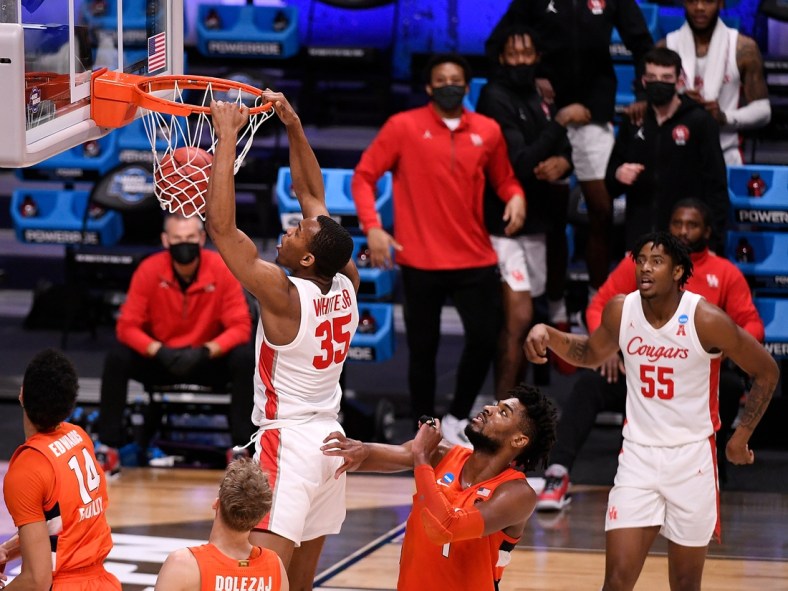 Mar 27, 2021; Indianapolis, Indiana, USA; Houston Cougars forward Fabian White Jr. (35) dunks during the second half against the Syracuse Orange in the Sweet Sixteen of the 2021 NCAA Tournament at Hinkle Fieldhouse. Mandatory Credit: Doug McSchooler-USA TODAY Sports