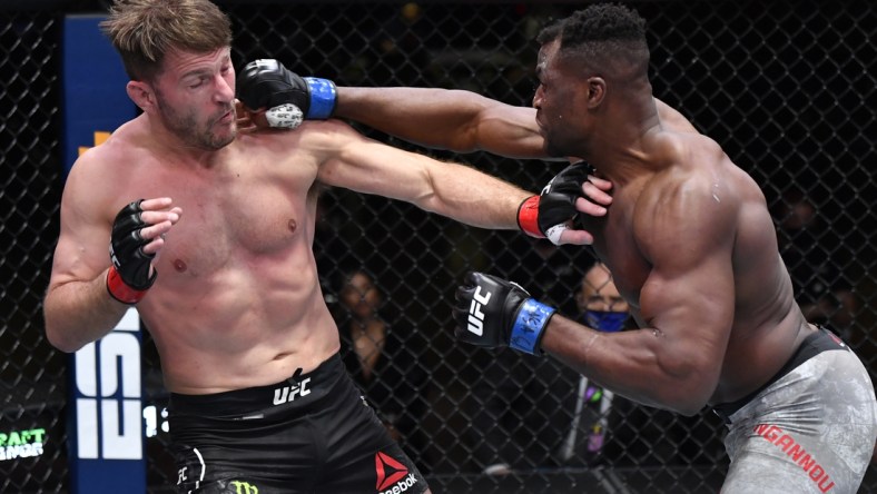 Mar 27, 2021; Las Vegas, NV, USA;   Francis Ngannou of Cameroon punches Stipe Miocic in their UFC heavyweight championship fight during the UFC 260 event at UFC APEX on March 27, 2021 in Las Vegas, Nevada.   Mandatory Credit: Jeff Bottari/Handout Photo via USA TODAY Sports